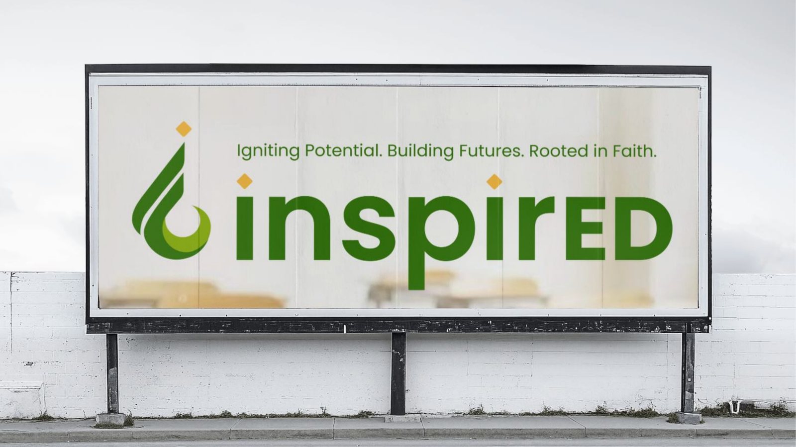 InspirED logo on a billboard